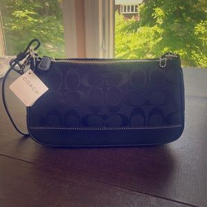 Coach clutch with removable strap